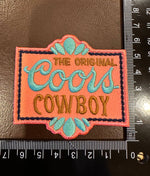 C**rs Cowboy Turquoise and coral Beer Trucker Hat Patch